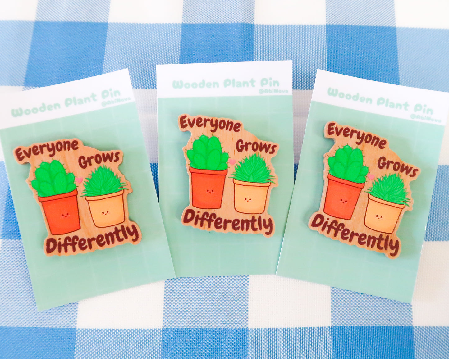 "Everyone Grows Differently" Wooden Pin