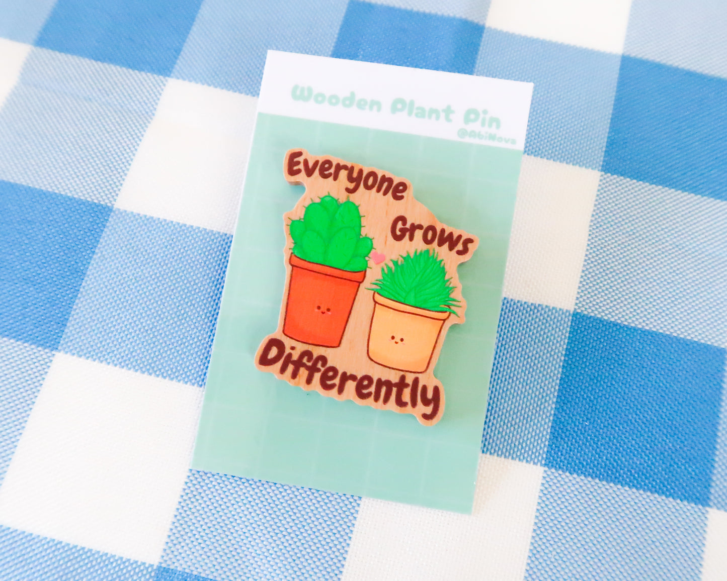 "Everyone Grows Differently" Wooden Pin