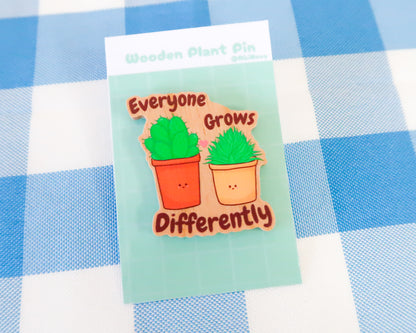 "Everyone Grows Differently" Wooden Pin